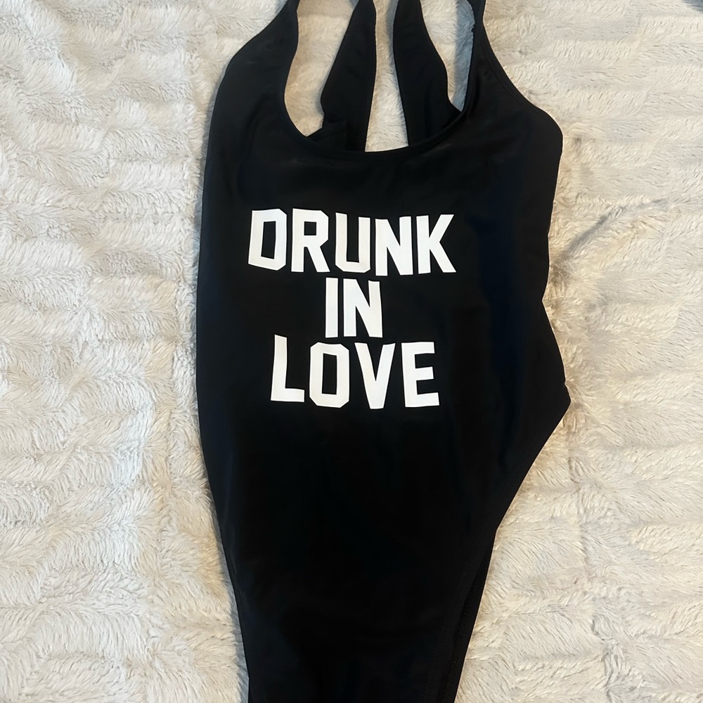Ravesuit: swim suit wore once